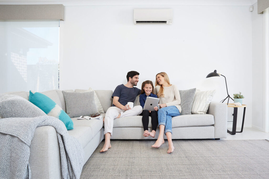 family enjoying under heating and cooling system